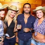 a group of people wearing cowboy hats